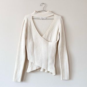 statement ribbed sweater with mock neck & cross-front in cream